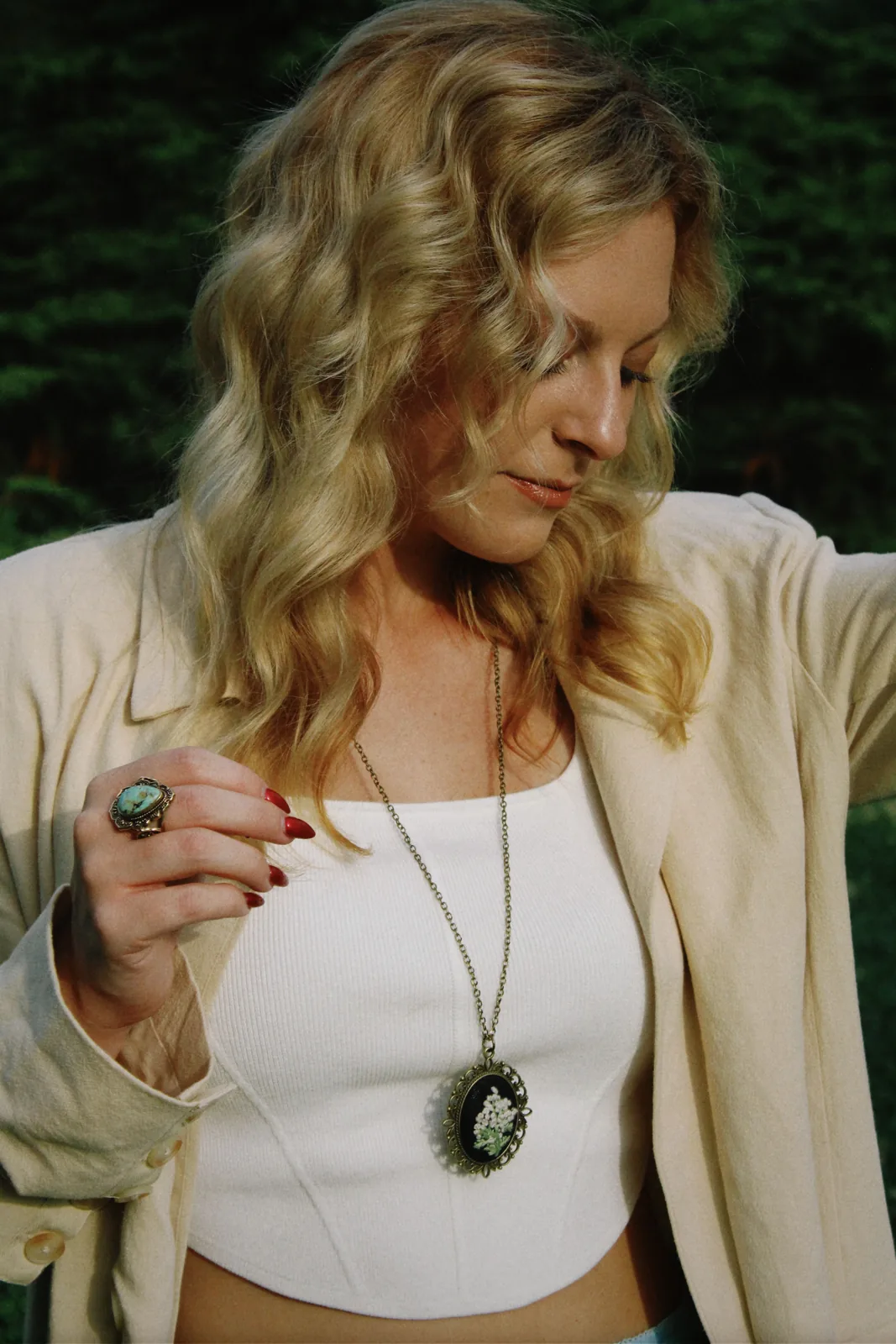 Woman wearing a vintage cameo necklace